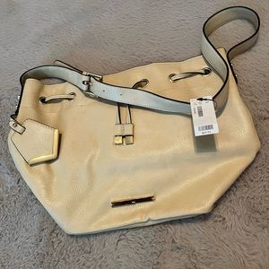 NEW crème The Limited purse.